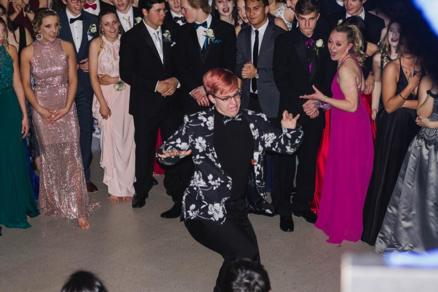 Sophomore Brady Schafer death drops within an impromptu dance circle. This was at prom in 2018.