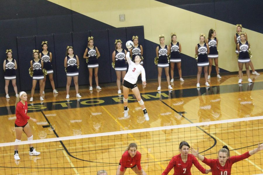 Senior Maggie McElhose serving the ball at the Elkhorn vs. Elkhorn South game.