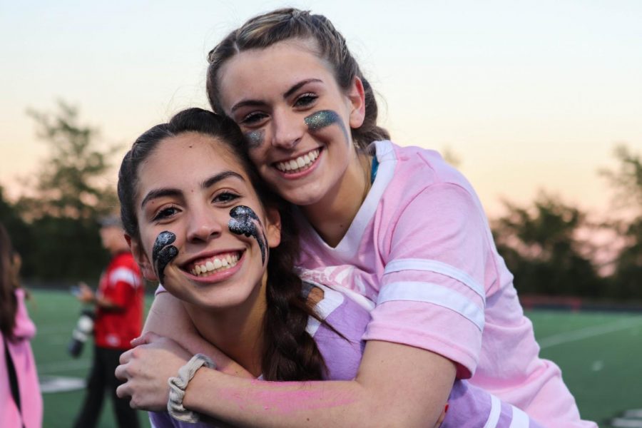 Seniors Allyssa Perotto and Julia Labegaline celebrate the senior class at the annual Powder Puff football game. #BeKind activities were part of Homecoming week festivities.