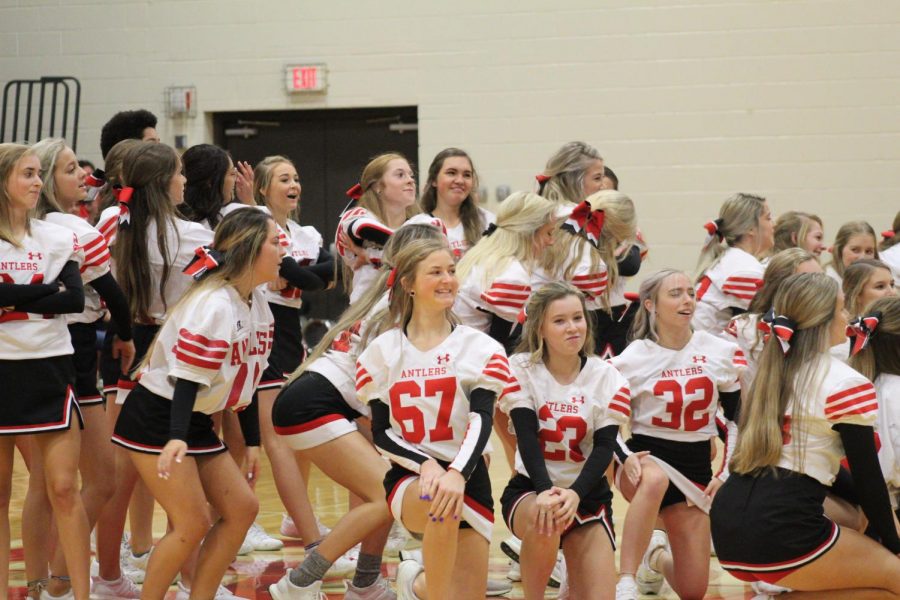 The cheerleaders and the dance team performed together at the pep rally.