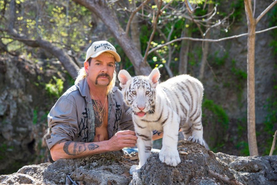 Joe Exotic pictured with one of the tiger cubs at his Oklahoma zoo.