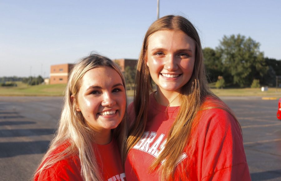 Seniors Rileigh Mull and Haley Debuse enjoying the tailgate before the game.