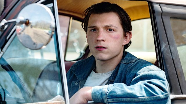 Tom Holland plays Arvin Russel, a young man devoted to halting all evil.