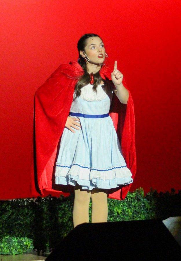 Little Red Riding Hood sings.