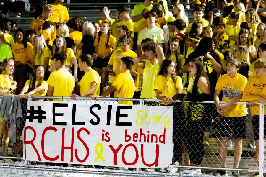 The students of Roncalli hang a sign and wear yellow to support EHS Freshman, Elsie Rochholz, that has been diagnosed with cancer. Friday, Sept. 3rd. Antlers win 34
