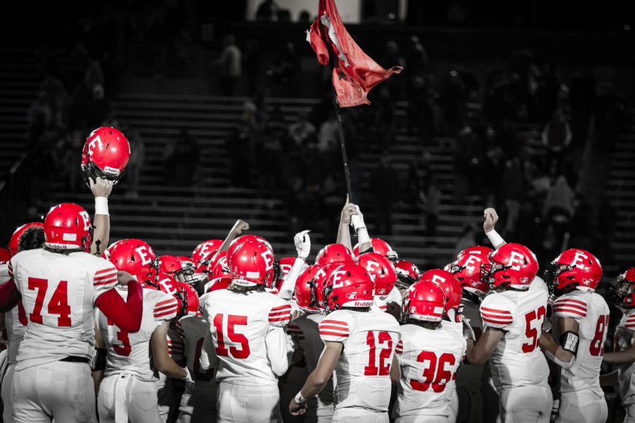 Antlers celebrate the win against Elkhorn North 35-12.  The Antler football team storms to the middle of the field to wave and plant their flag. Friday, October 15th. 