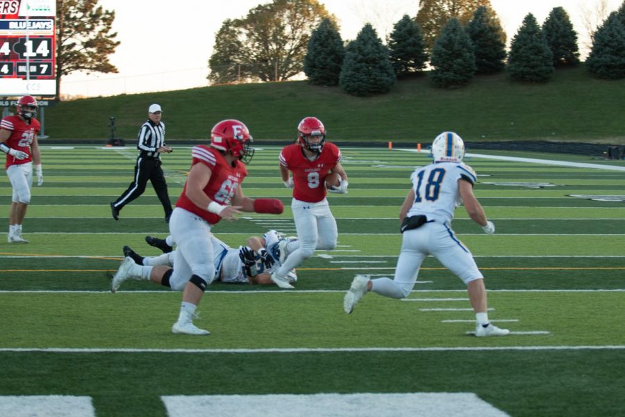 #9 Henry (Hank) Kroger running towards the endzone for a touchdown against Seward. Antlers beat the Bluejays with a score of 35-20. 