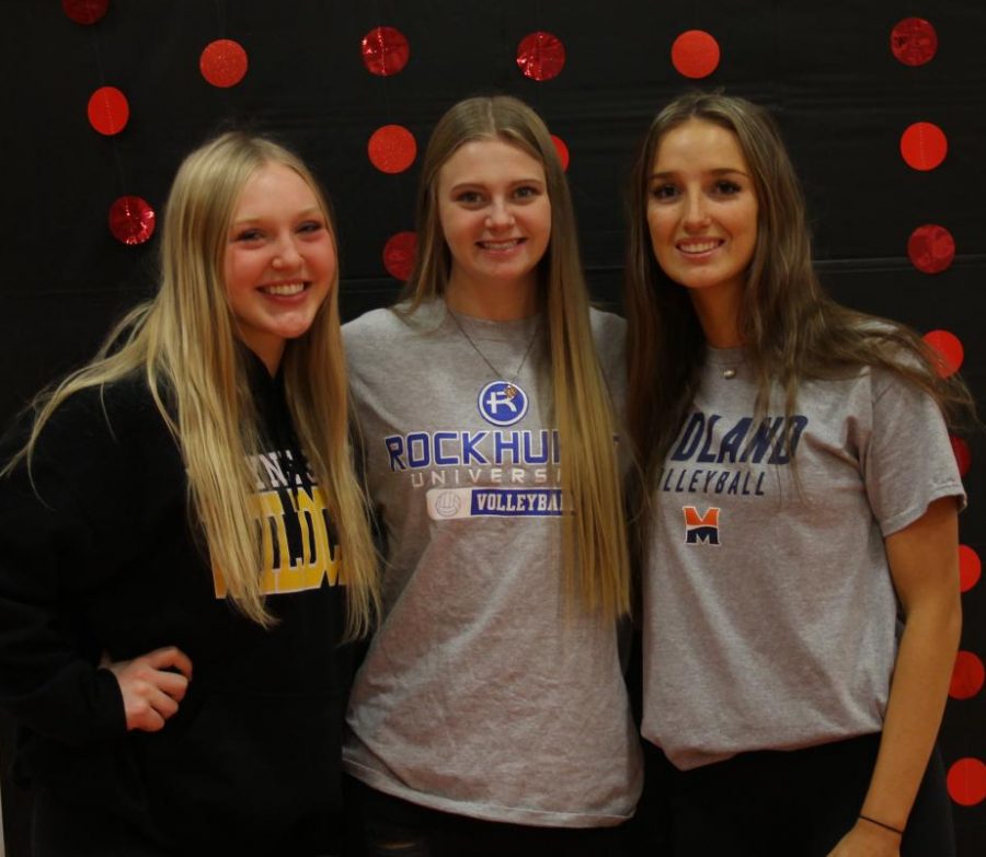 Senior Taylor Bunjer, Sydney Raszler and Hannah Fast celebrate signing day. All three will play volleyball in college.