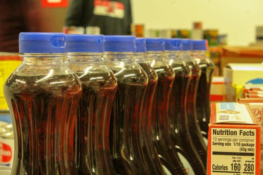 Syrup+bottles+lined+up+for+the+food+drive.