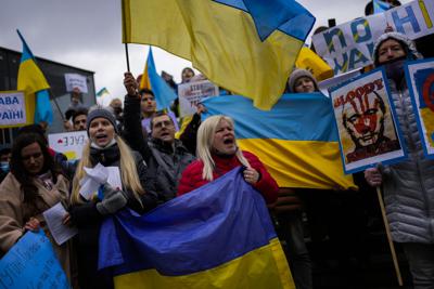 Protesters marching to demonstrate their disapproval of the war. Photo Courtesy of AP News.