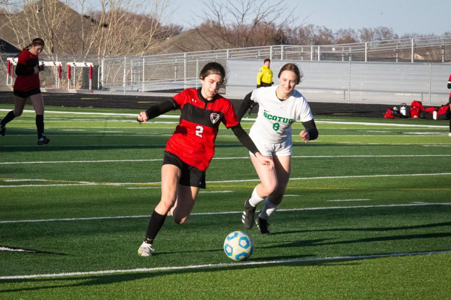 #2 Olivia Bailey gets the ball after a failed shot on goal from Columbus Scotus. Antler Girls beat Columbus Scotus 2-1. Friday, March 25. 