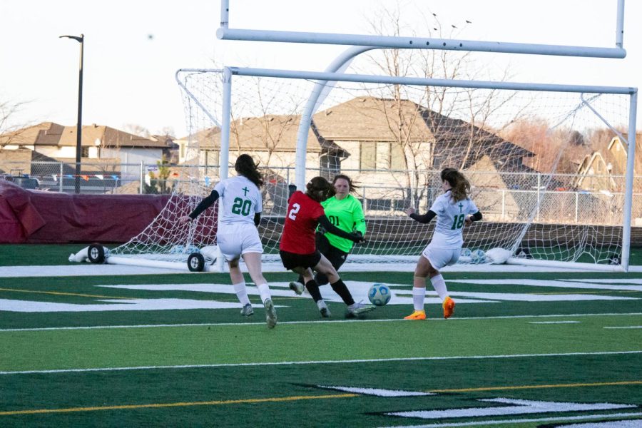 #2 Olivia Bailey pushing towards goal, getting around all of her opponents and scores the second goal of the game. Antler Girls beat Columbus Scotus 2-1. Friday, March 25. 
