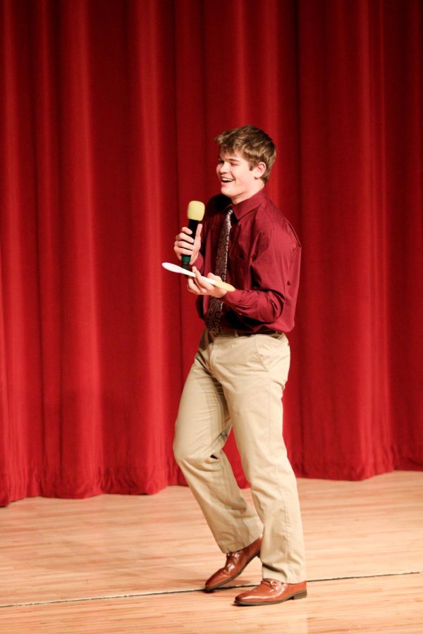 Ben Kubicek creates an advertisement during the Mr.EHS pageant. Kubicek came up with a product for making sandwiches. 