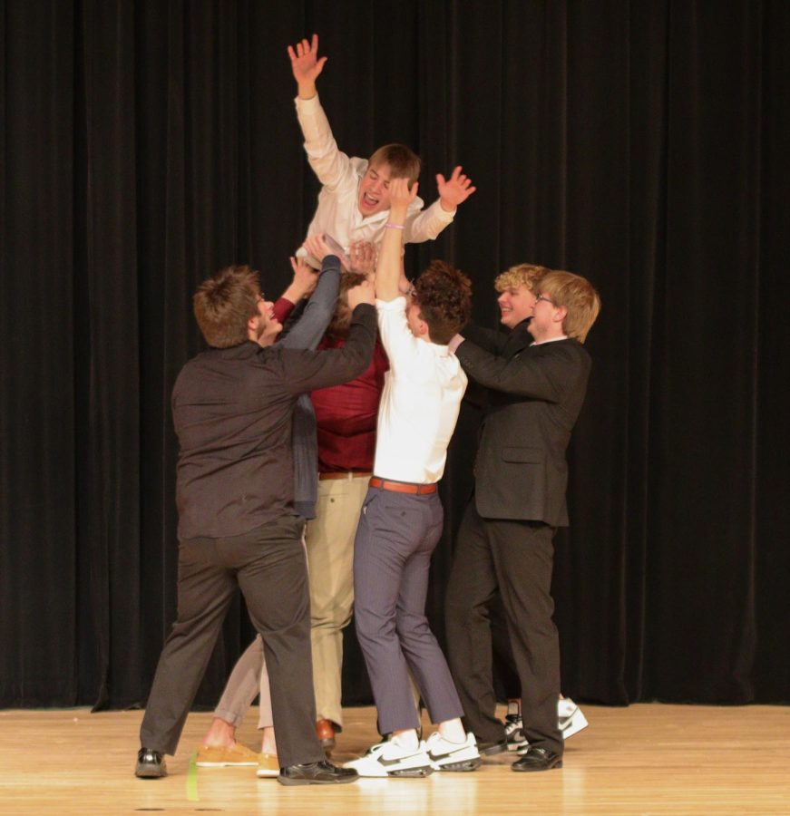 During+the+lip-sync+battle%2C+pageant+members+lifted+up+Zach+Leinen.+They+performed+songs+during+the+Mr.EHS+pageant.+