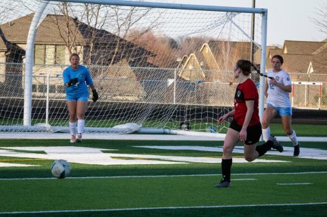Reese Chard looks towards goal as she is about to go for the shot. Elkhorn North beats the Antlers 3-0. Monday, April 11th