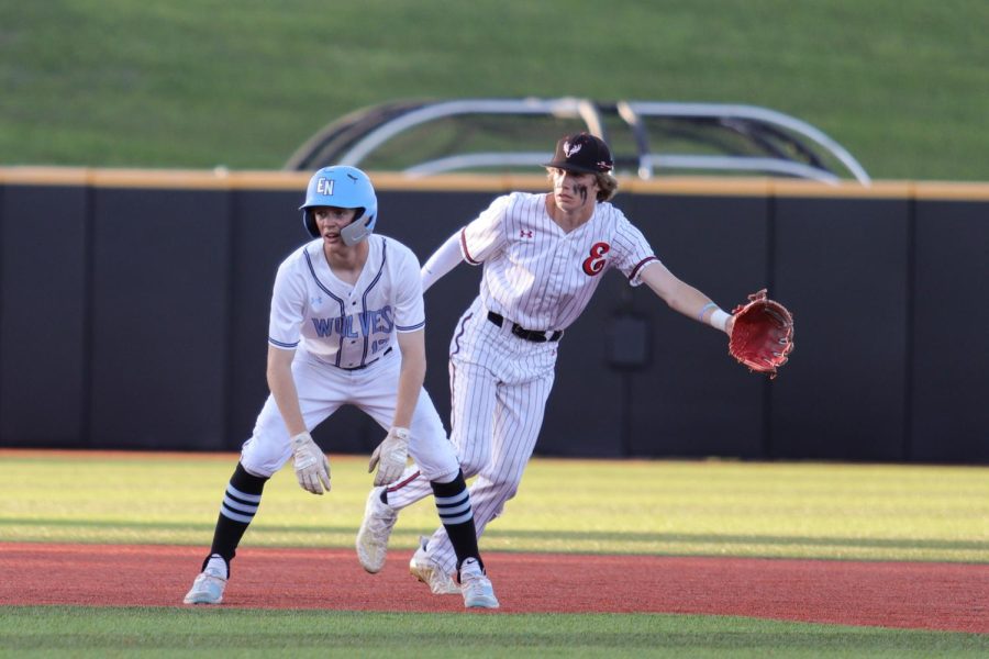 Blake Knott prepares for the pitcher to throw the ball to second base to get the Elkhorn North player out. Elkhorn played Elkhorn North in the 2022 State Baseball Tournament.