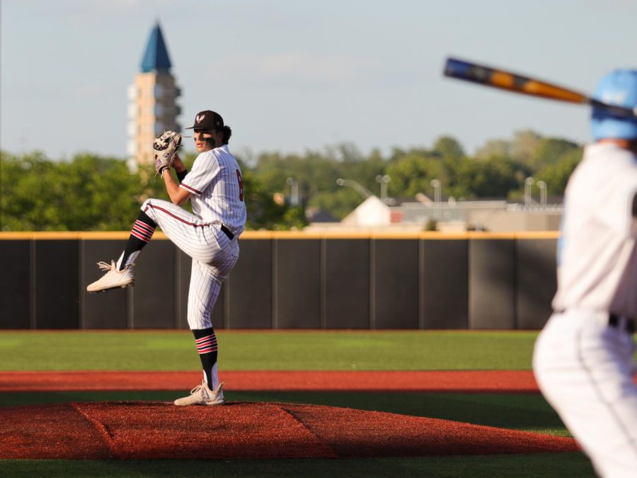 Pitcher Ben Ayala prepares to throw the ball at an Elkhorn North batter. Elkhorn played Elkhorn North in the 2022 State Baseball Tournament.