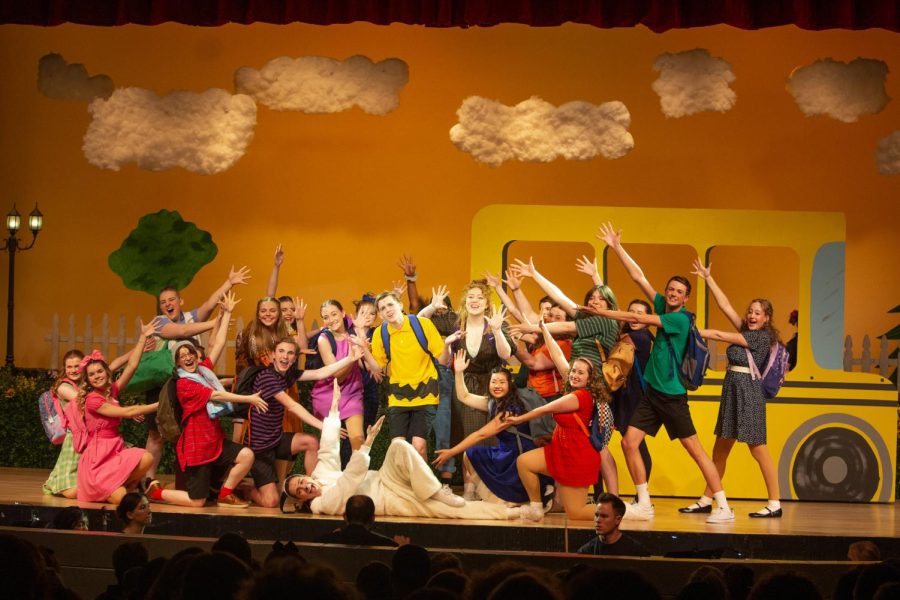 The+cast+of+the+musical+surround+Charlie+Brown.+Brown+was+played+by+senior+Beau+Beard