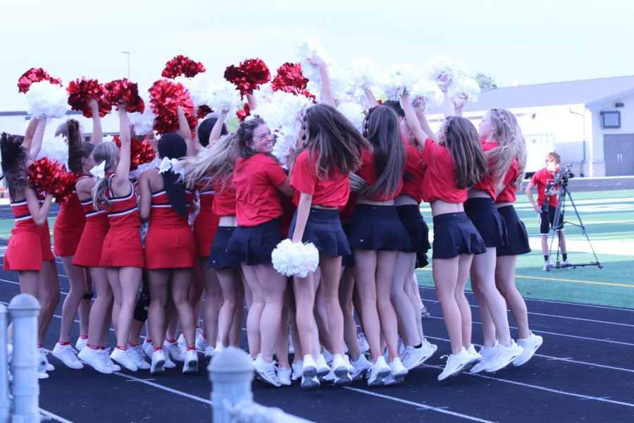 Elkhorn Dance and Cheer team rally together to hype up the student section and players.  