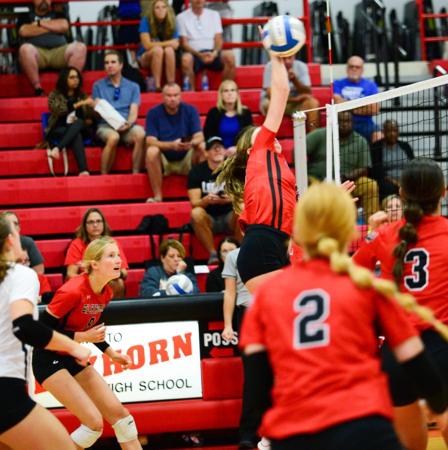 An Elkhorn Volleyball player defends against an incoming serve from Omaha Marian.  The Antlers won 3 games to 0. 