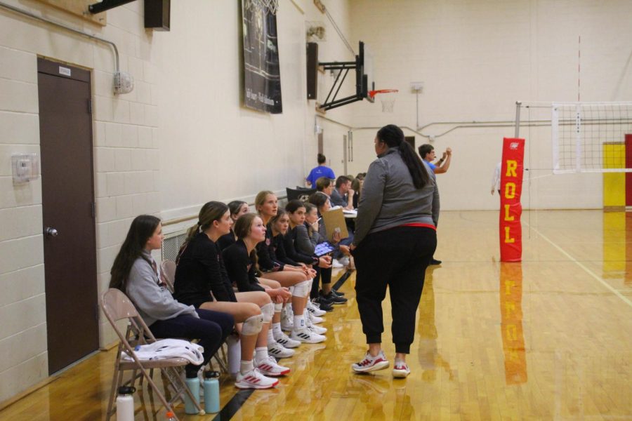 Coach Morgan Johnson encourages her bench. 