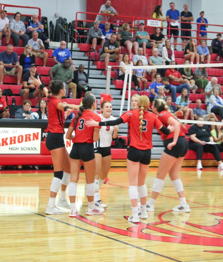 Elkhorn Antlers celebrate their victory over Mercy
