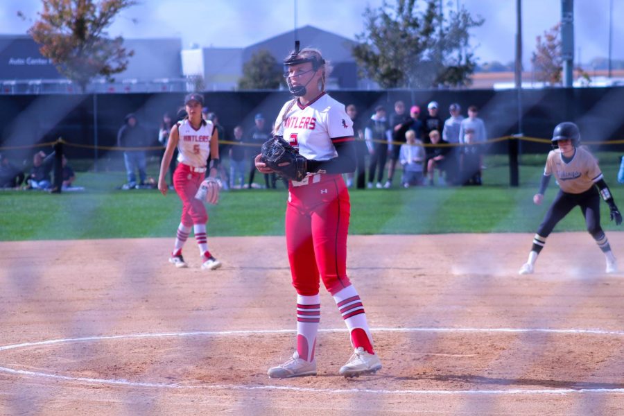 Emerson Karstens waits for her catcher to throw her the ball back on October 14th.