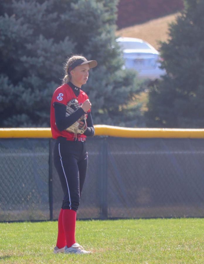 Emma Hague watches her pitcher prepare herself from center field.
