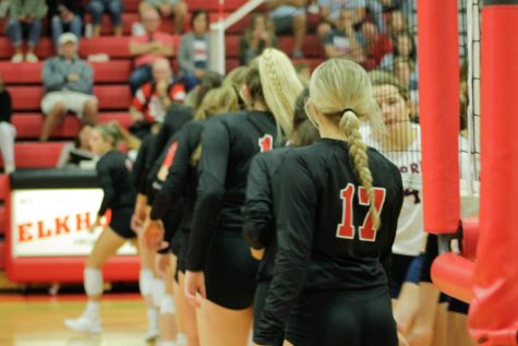 The Antler Varsity Volleyball team wishes their opponents luck before the game. 