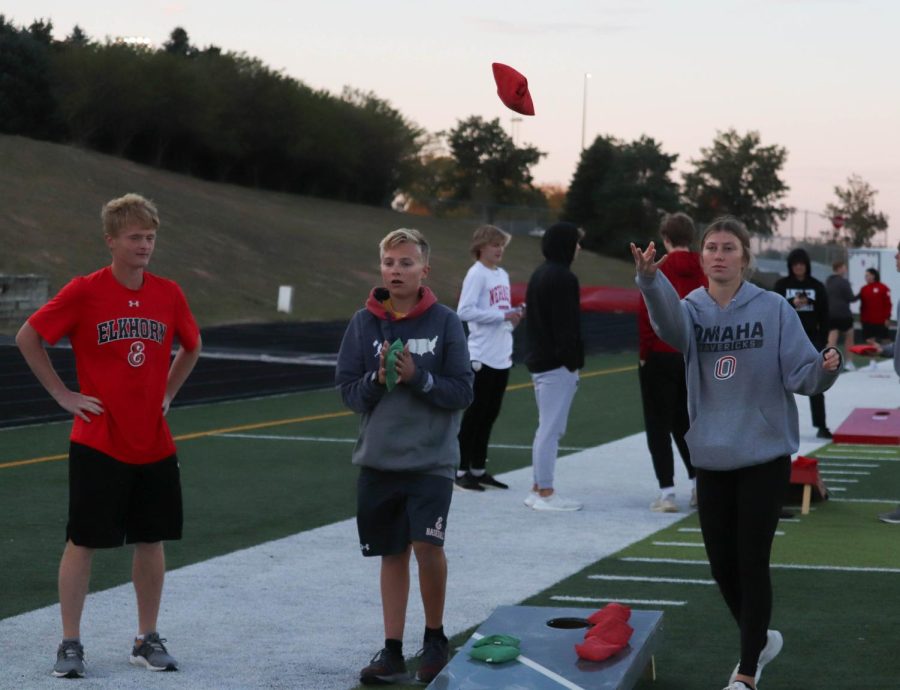 EHS students playing bean bag toss at the burning of the E