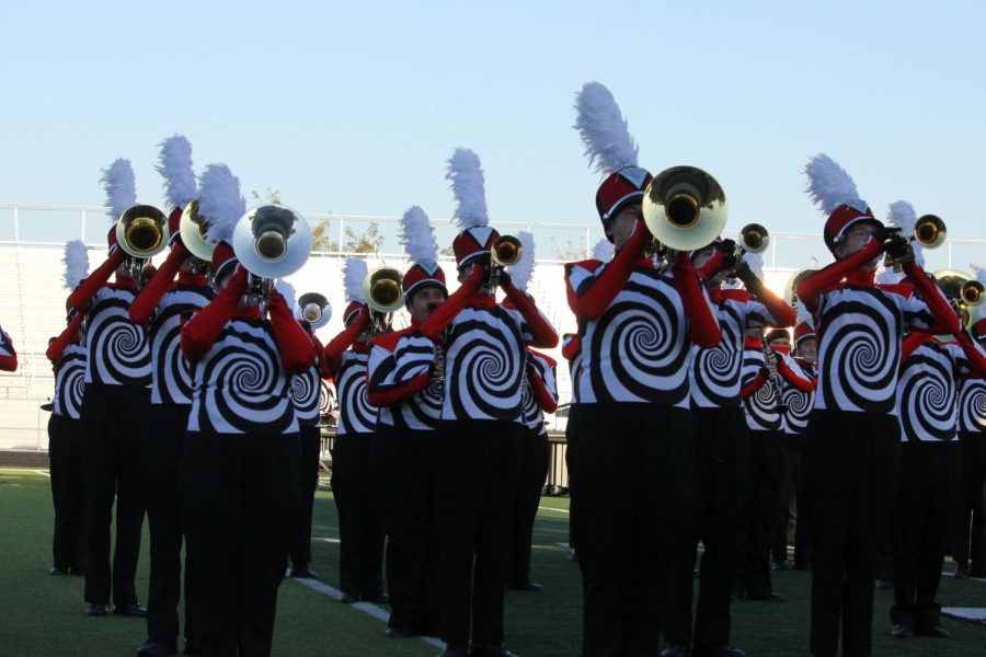 The Elkhorn brass section plays their instruments during their performance. 