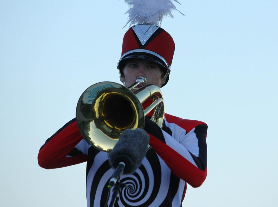Junior Grant Spanel perfoms his solo during the marching band show. 
