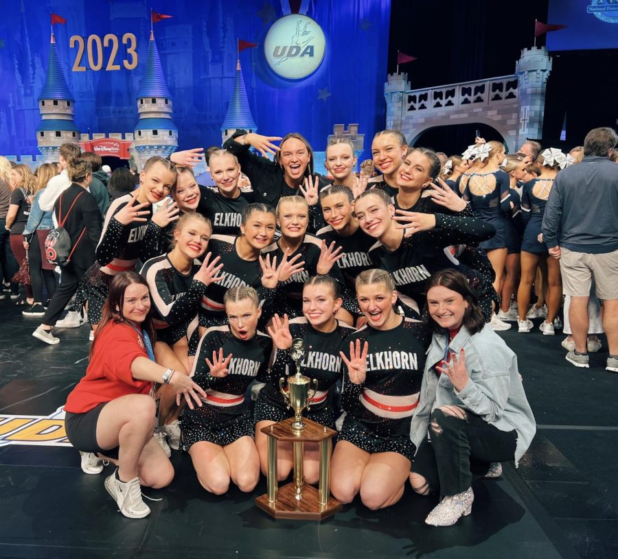 The Elkhorn High School Dance Team celebrates after receiving the trophy for fourth in the nation. They made school history by performing the schools highest-placing routine in history.