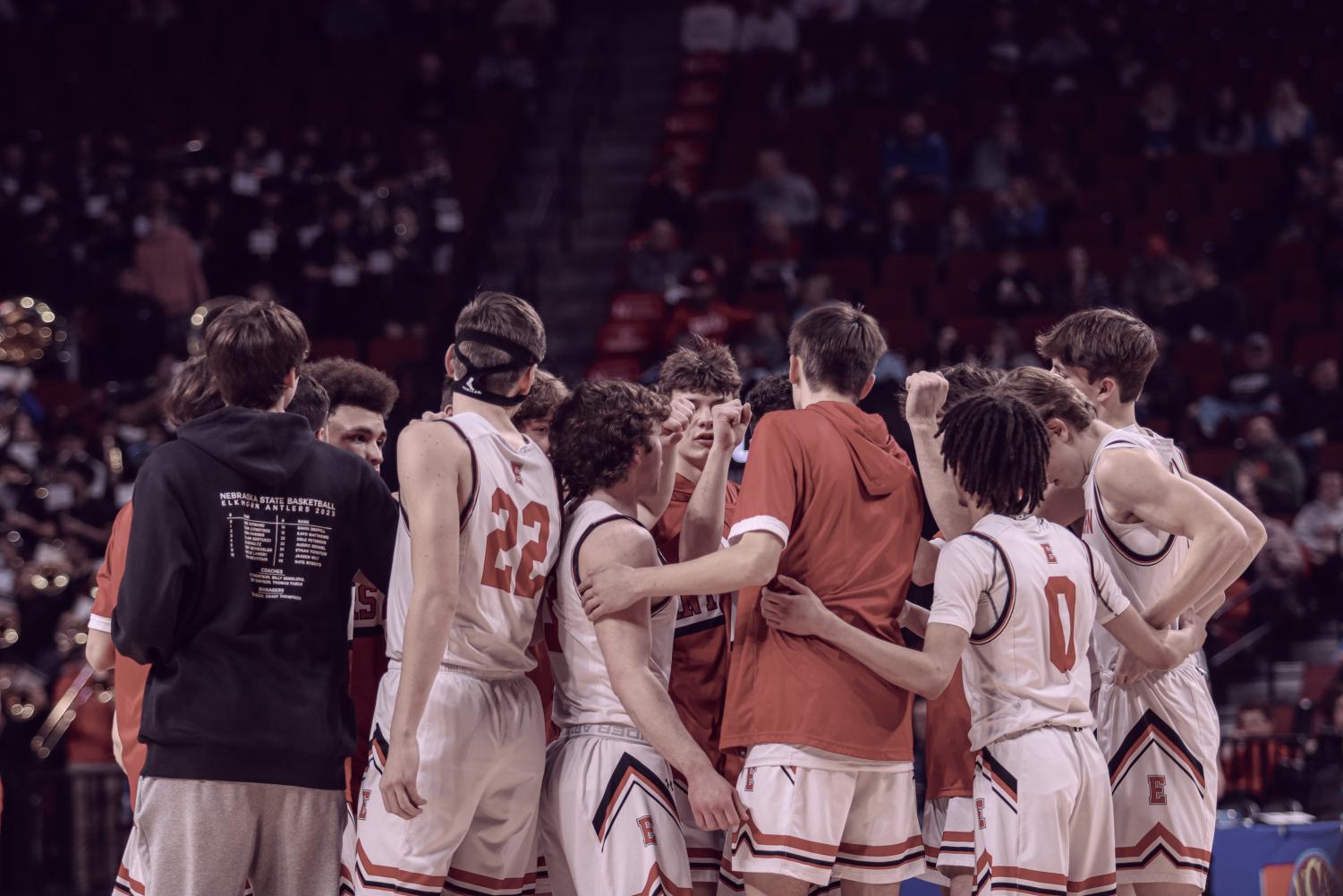 The Antler boys basketball team breaks a huddle to begin their state game versus Crete during the 22-23 season.