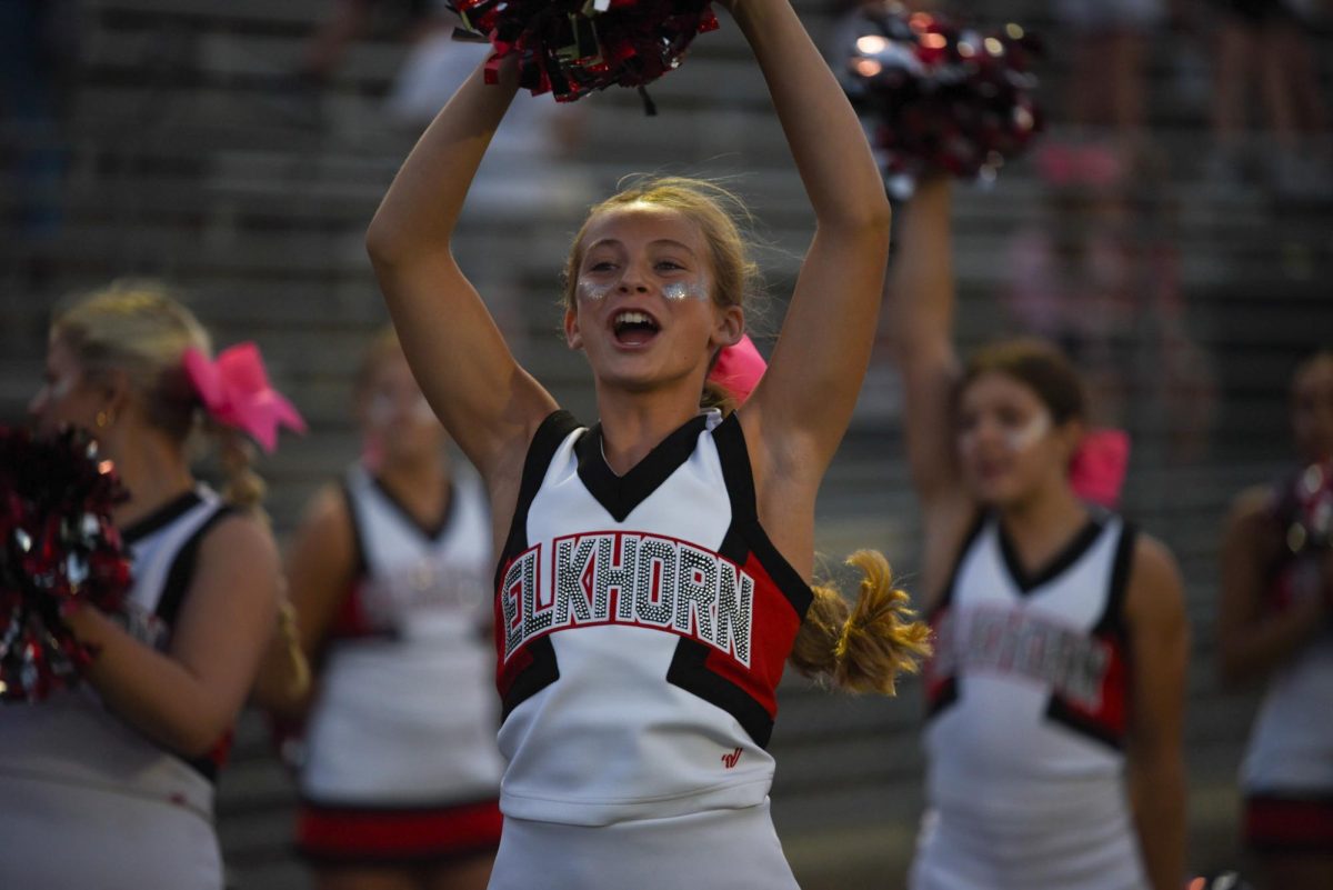 Freshman Jillian Narber cheers for the Antlers during the scrimmage. Red beat White 62-7 on Friday, August 18th.