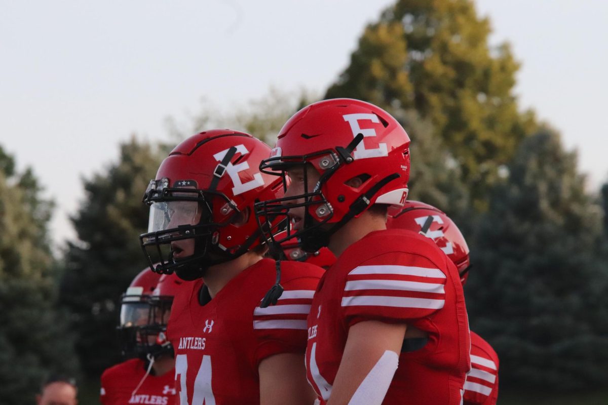Senior Erik Pfahl and junior Peyton Turman watch the scrimmage from the sidelines. Red beat White 62-7 on Friday, August 18th. 