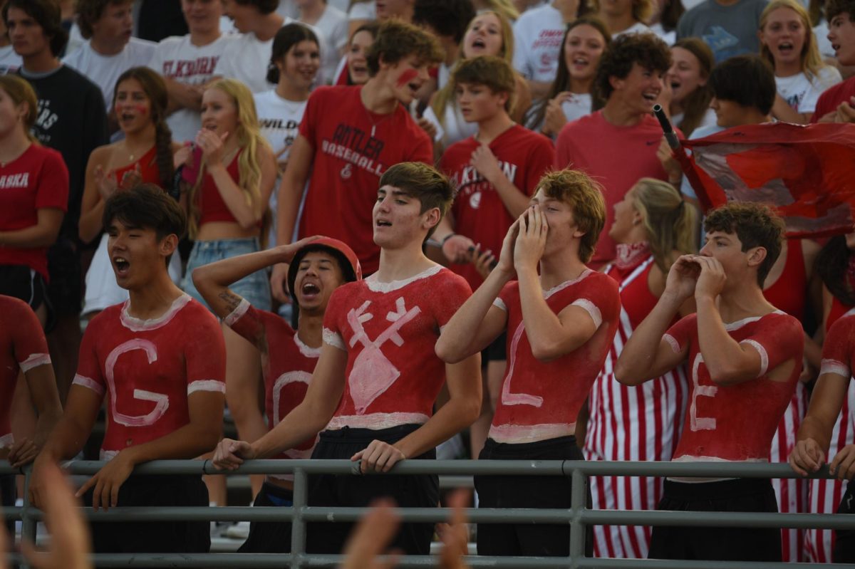 The painters cheer for Antler football. Red beat White 62-7 on Friday, August 18th.