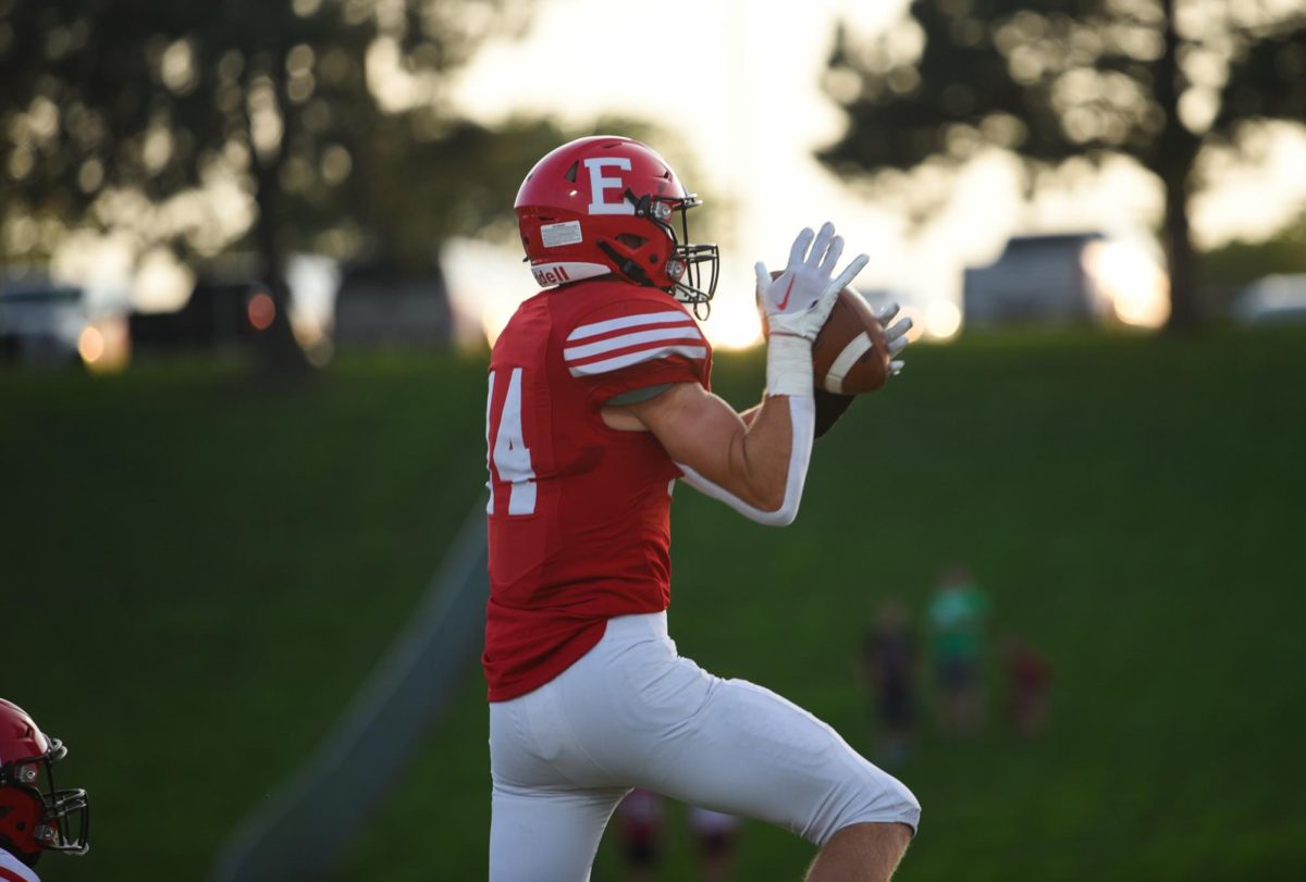 Junior Peyton Turman jumps to catch the ball near the endzone. Red beat White 62-7 on Friday, August 18th.