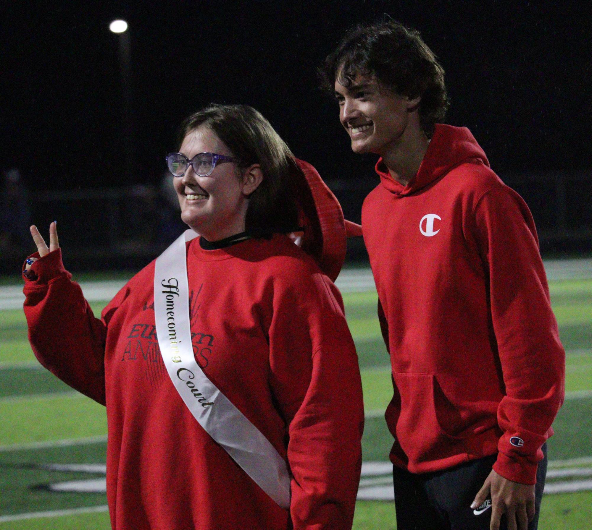 Seniors Lawson Clevenger and Phoebe Zimmerman are honored at Elkhorns football homecoming game.