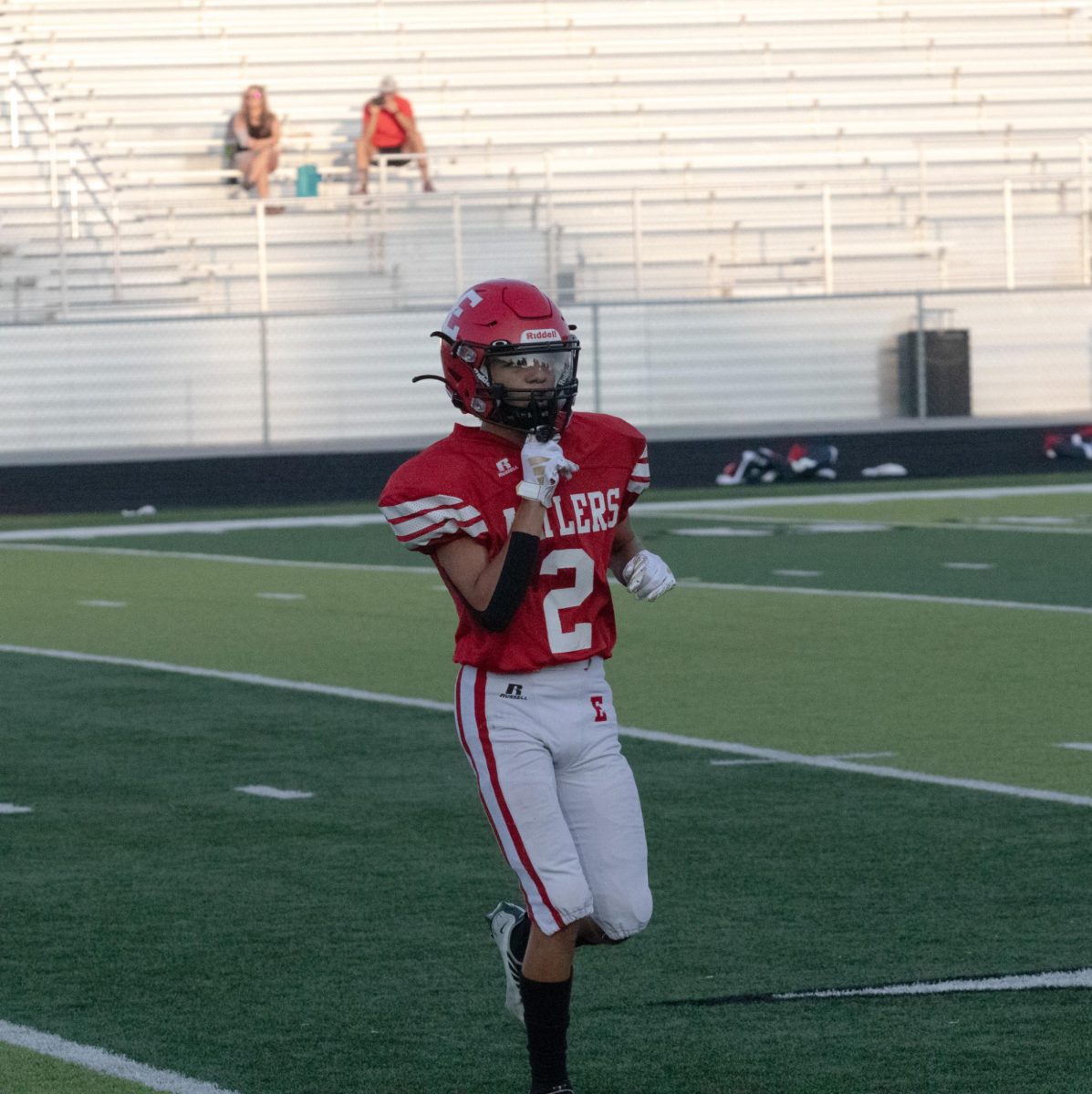 Freshman Cooper Sutton runs off the field after a play. Freshman Antlers lost 35-7 to Norris.                                                                                         
