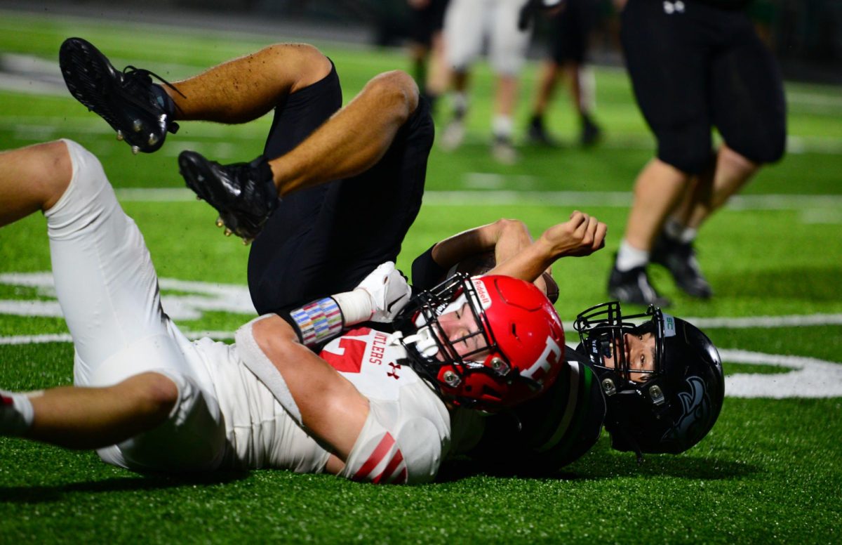 Junior Charlie Lamski tackles a Skutt player to the ground. The Antlers lost to the Skyhawks 45-0 on Friday, September 15th.