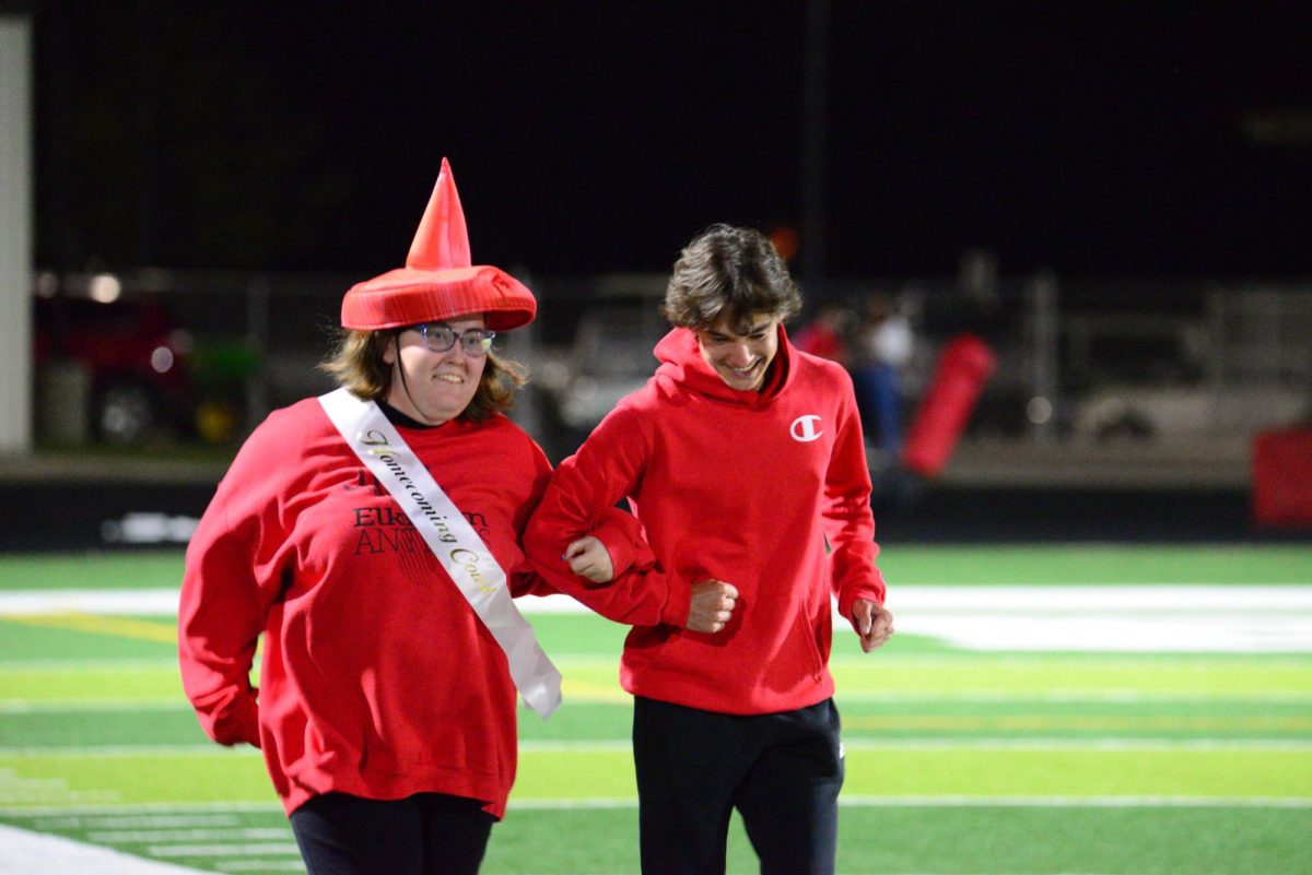 Senior Lawson Clevenger and senior Phoebe Zimmerman walk down the field for homecoming court. They won king and queen at the homecoming dance on Saturday, September 23rd.