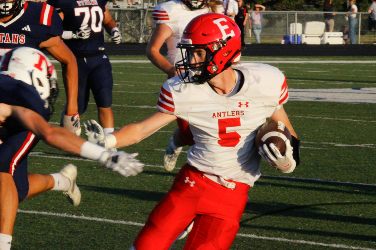 Senior Andrew Salvatore runs the ball down the field. The Antlers beat the Titans 26-24 on Friday, September 1st.