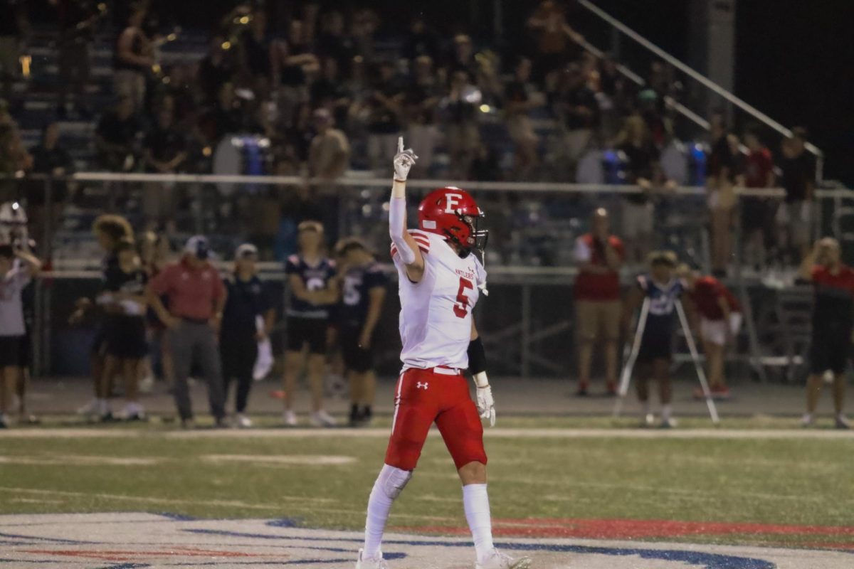 Senior Andrew Salvatore points towards the endzone. The Antlers beat the Titans 26-24 on Friday, September 1st.