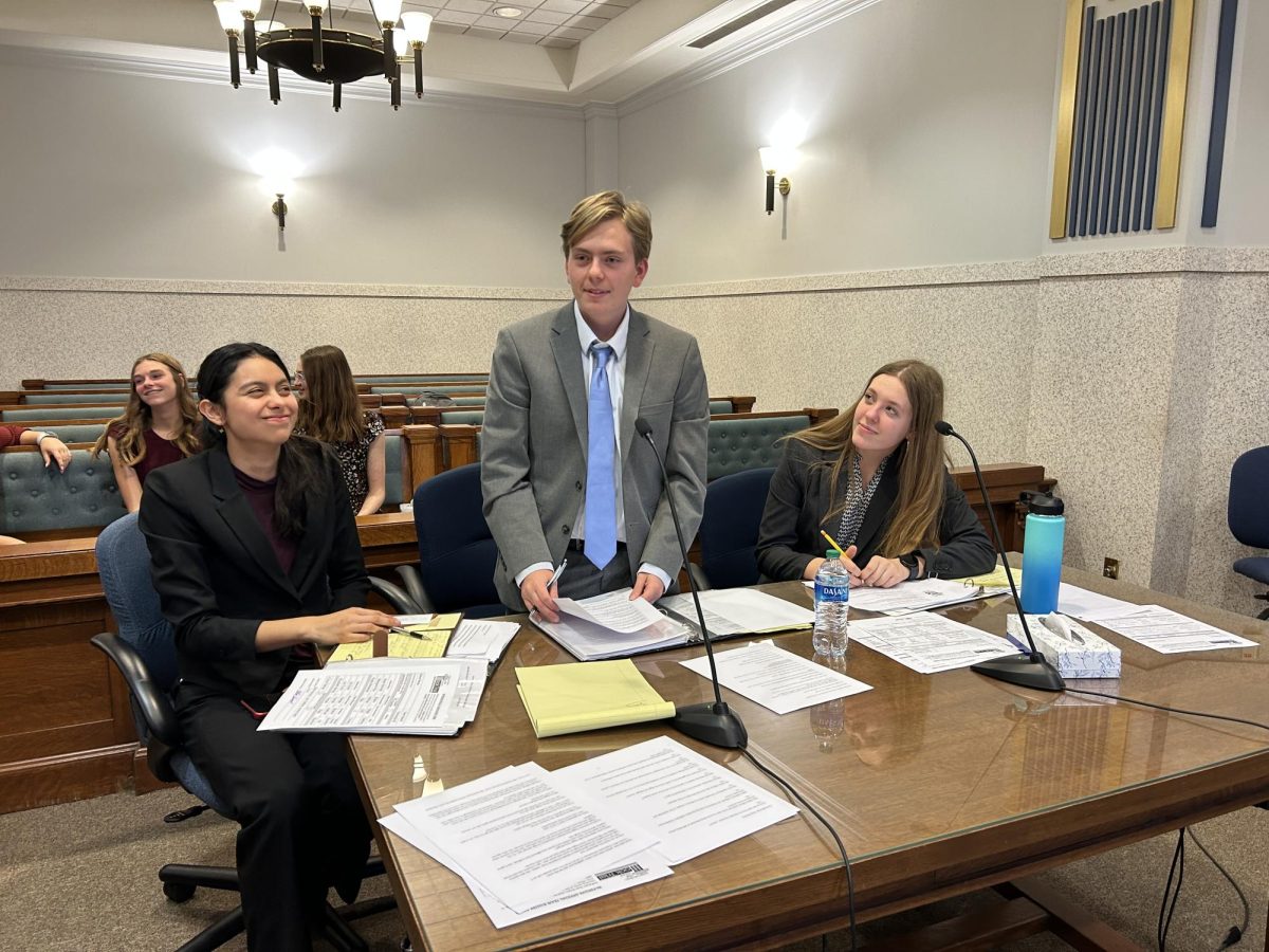 Senior Chris Wickham addresses the judge during a mock trail competition at the Douglas County courthouse. Wickham was the defense attorney during the trial.