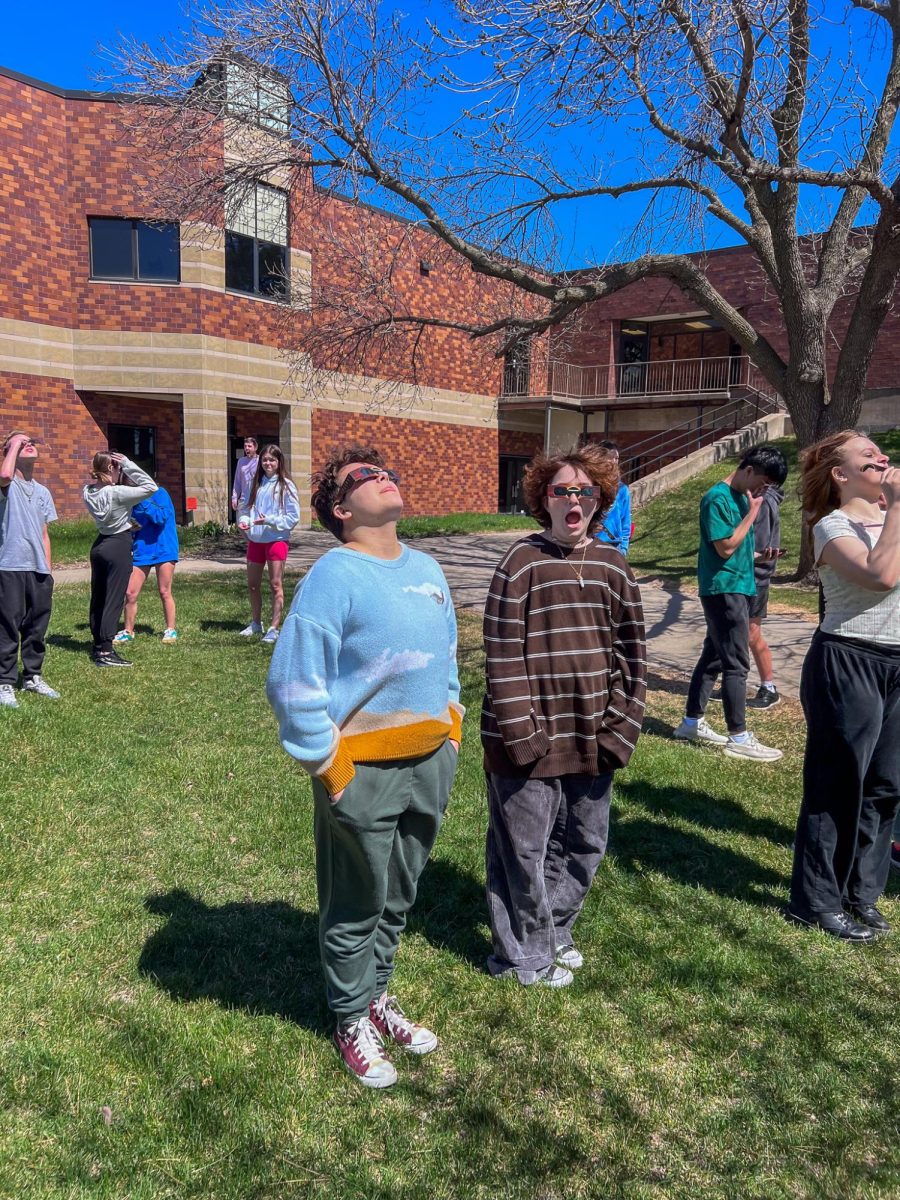 Students react in awe to the eclipse on Monday, April 8. 