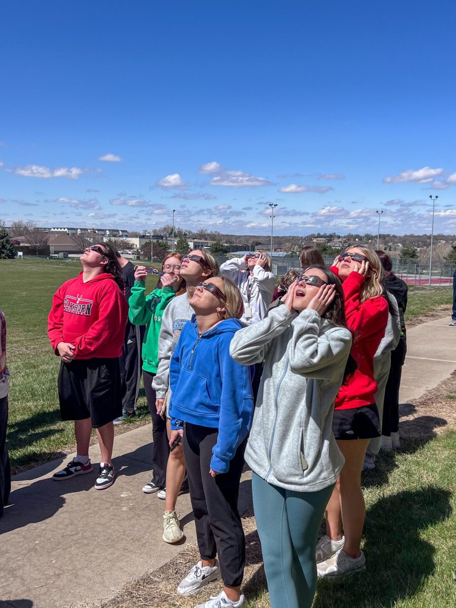 Students watch the eclipse during 6th hour classes, Monday, April 8.