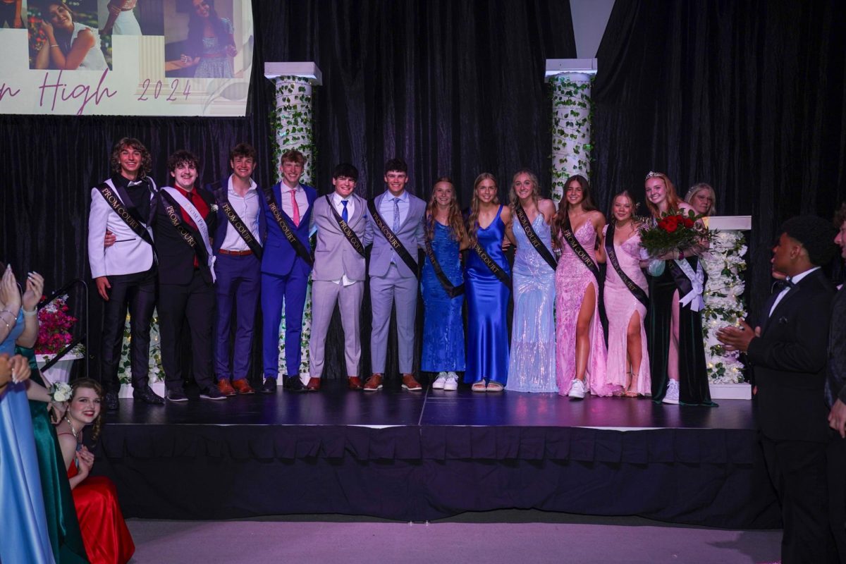 The juniors on prom court pose for a picture after they announced the winners.