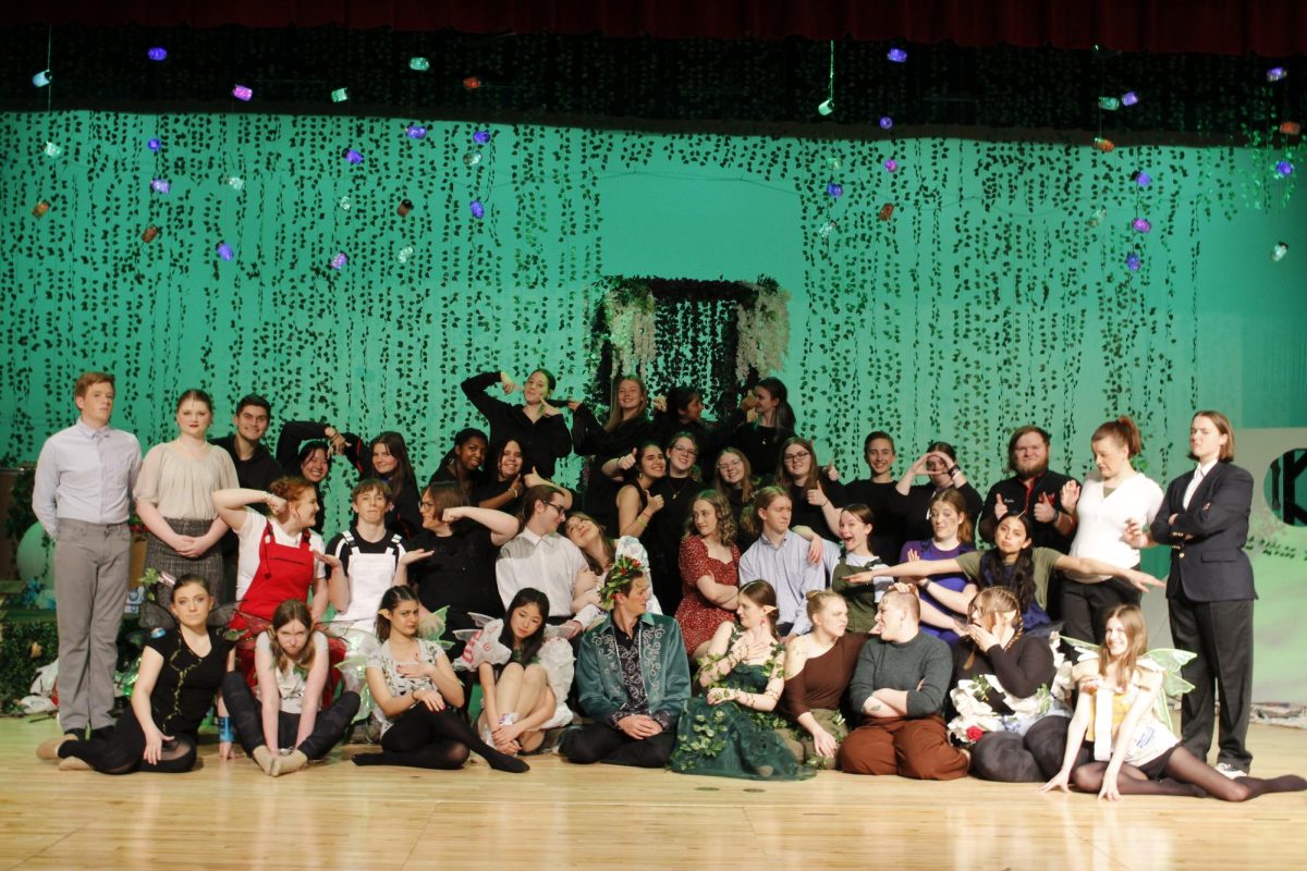 The cast of A Midsummer Nights Dream poses for a cast photo. This was the final production of the theater season.