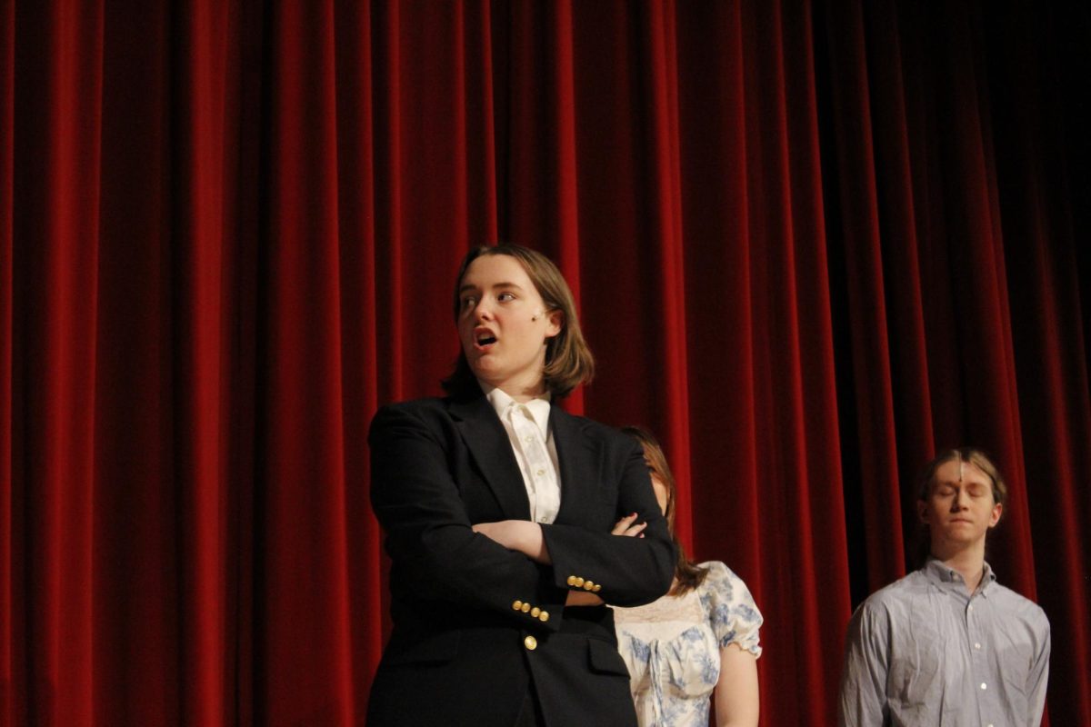 Sophomore Chase Engel (Egeus) angrily explains that Lysander and Hermia cannot get married. 